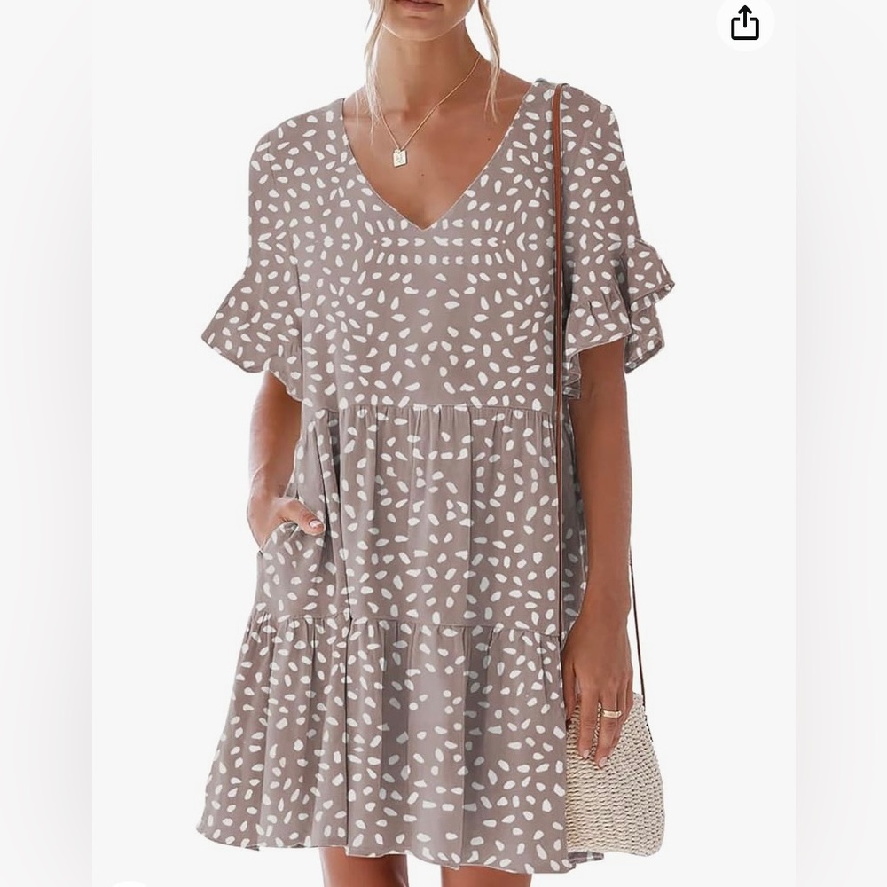 Babydoll dress by nclook with ruffle selves and pockets! Size Medium